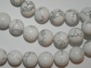 Perle Howlite blanche ronde. La perle