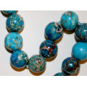 Perle Howlite bleue ronde 14mm. La perle