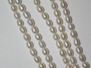 Perle d'Eau douce Olive 6mm. La perle