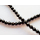Perle Tourmaline noire ronde. La perle