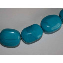 Perle Howlite bleue olive 20mm. La perle