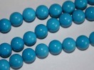 Perle Howlite bleue ronde. La perle