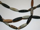 Perle Jaspe picasso olive fuseau 30mm. La perle
