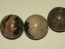 Perle Jaspe rose zébré ronde. La perle