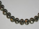 Perle Pyrite facettée 6mm. La perle