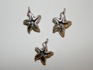 Perle intercalaire étoile argenté 14mm. La perle